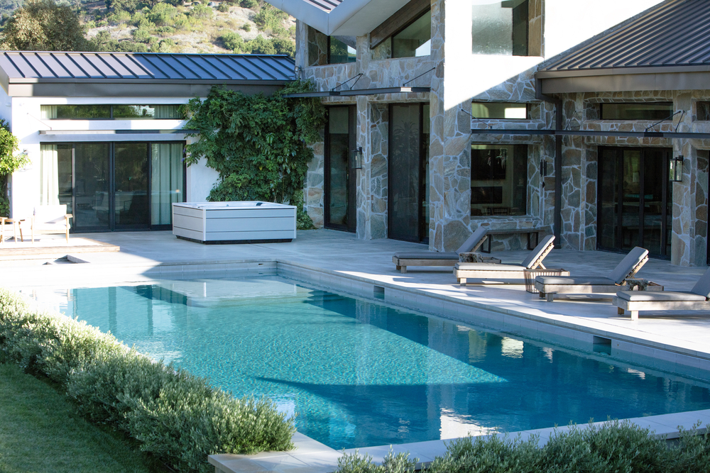 What is the monthly cost of owning a hot tub?